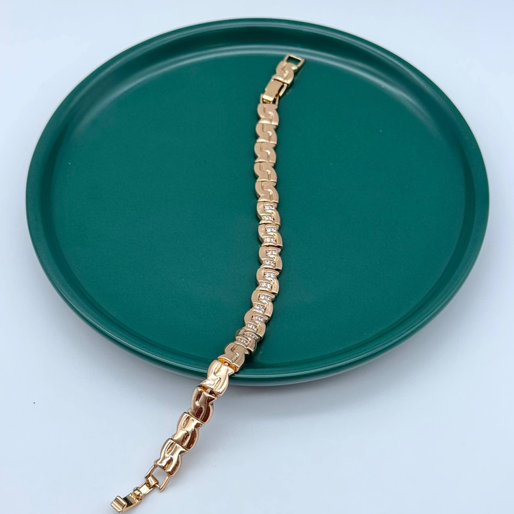 دستبند بدلیجات طلایی زنانه ژوپینگ طرح زنجیر نگین دار