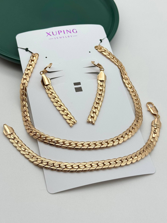 سرویس کامل بدلیجات زنانه ژوپینگ شامل گردنبند، دستبند و گوشواره آویز با طرح زنجیر ماری تخت (هیرینگبون)، آبکاری ضخیم طلا ۱۸ عیار