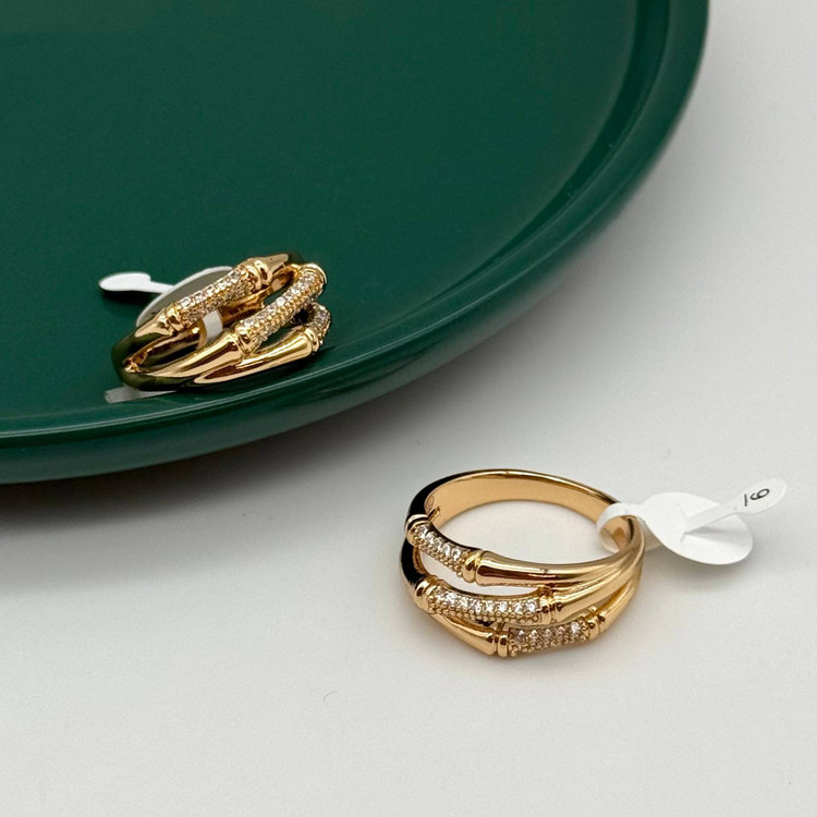 انگشتر ژوپینگ طلایی سه ردیفه طرح بامبو نگینکاری شده