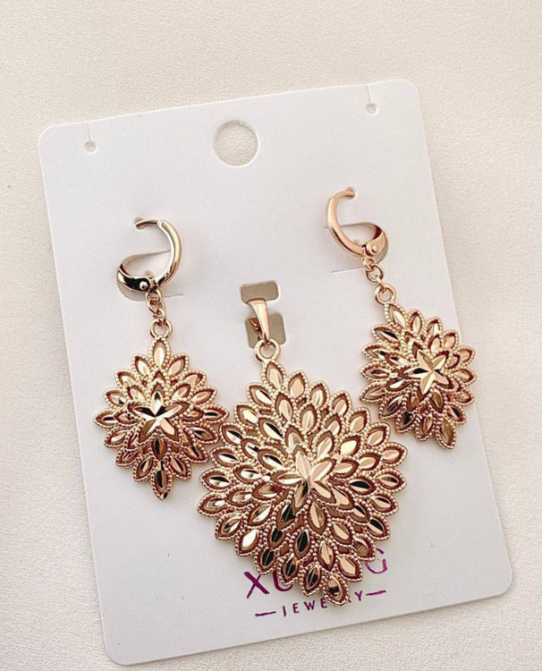 نیمست بدلیجات مارک ژوپینگ طرح خورشیدی شامل گوشواره و گردنبند