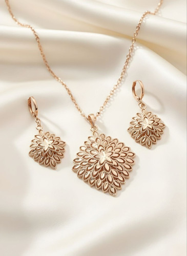 نیمست بدلیجات مارک ژوپینگ طرح خورشیدی شامل گوشواره و گردنبند