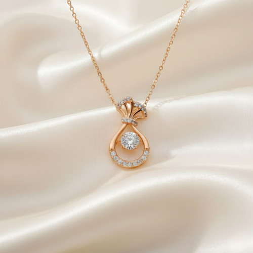 پلاک زنانه ژوپینگ طرح کیسه پول طلایی با نگین