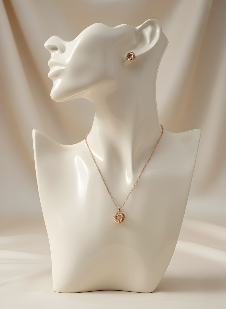 نیم ست رزگلد ژوپینگ طرح گره دایرهای شامل گوشواره و آویز