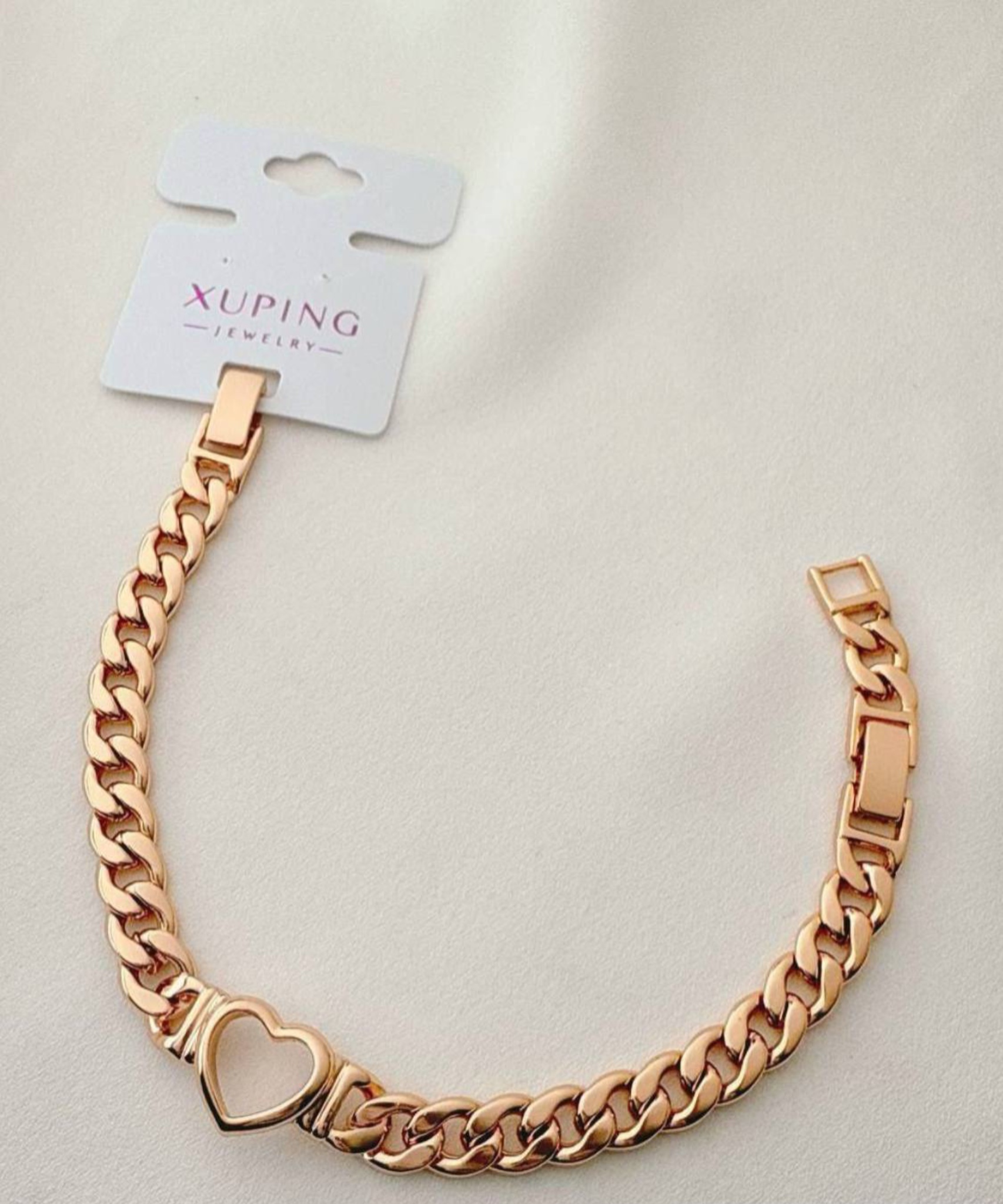 دستبند زنجیری ژوپینگ رزگلد با طرح تک قلب وسط و قفل تاشو