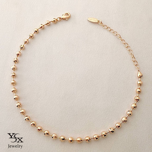 پابند طلایی برند YSX با گویهای تراشخورده و زنجیر رگلاژ