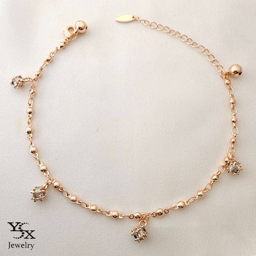 پابند رزگلد برند YSX با آویزهای نگیندار و زنجیر توپی