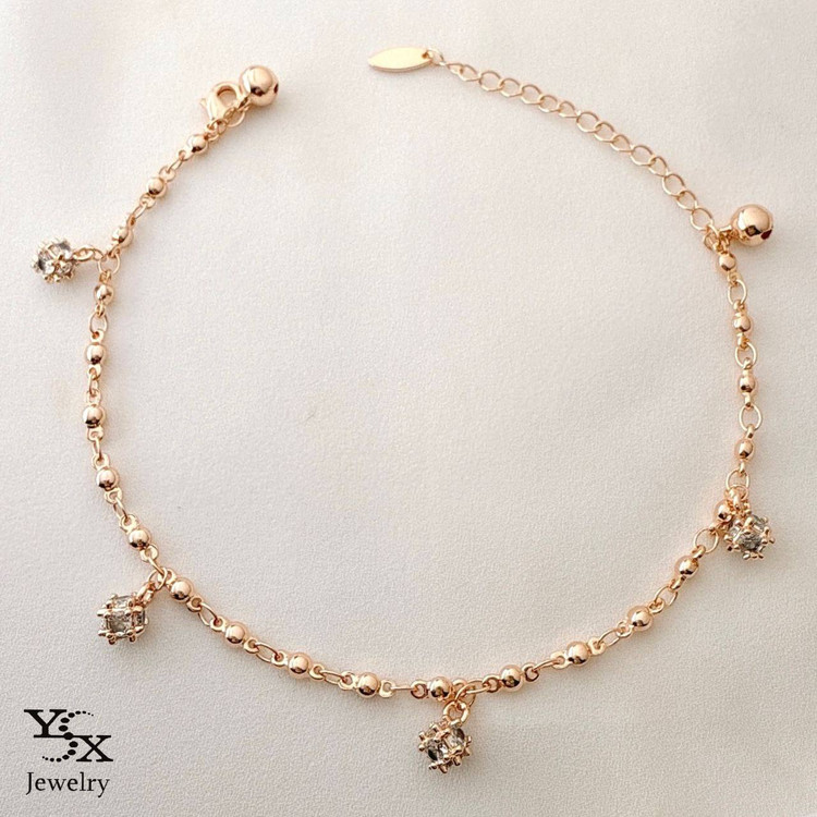 پابند رزگلد برند YSX با آویزهای نگیندار و زنجیر توپی