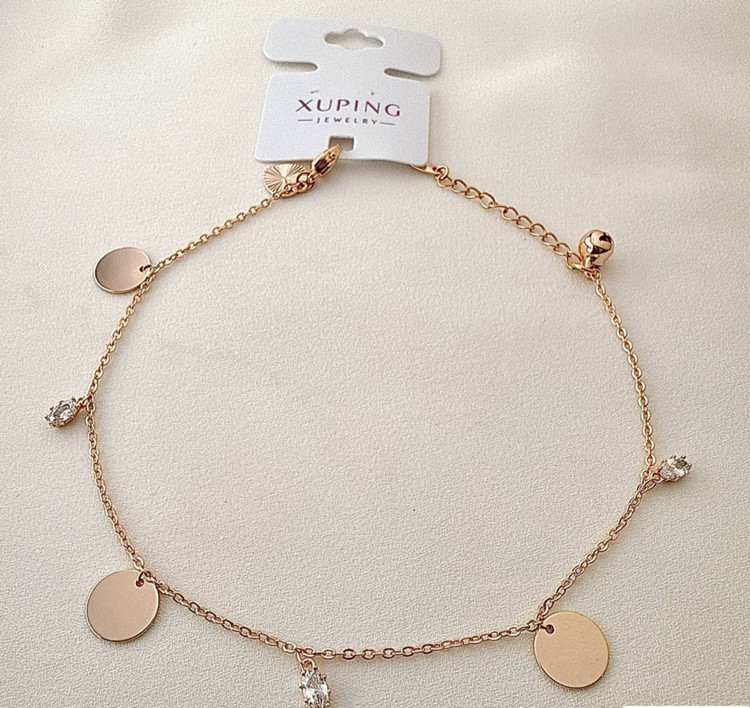 پابند طلایی برند ژوپینگ با آویزهای دایرهای تخت و نگینهای اتمی اشکی