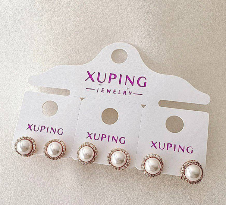 گوشواره میخی مرواریدی برند ژوپینگ با حاشیه نگینکاری شده ظریف