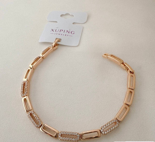 دستبند رزگلد ژوپینگ با طرح دانههای مستطیلی و نگینهای اتمی ظریف