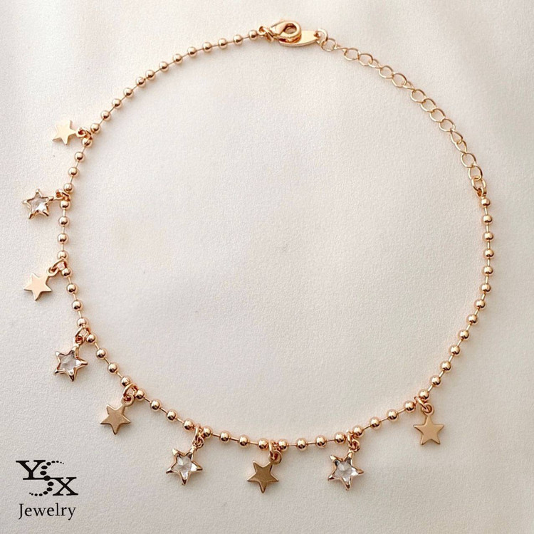 پابند برند YSX رزگلد با آویزهای ستارهای نگیندار و ساده