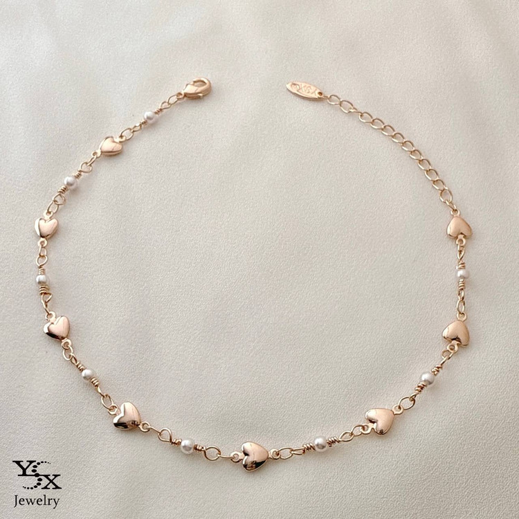 پابند رزگلد برند YSX با آویزهای قلب و مروارید