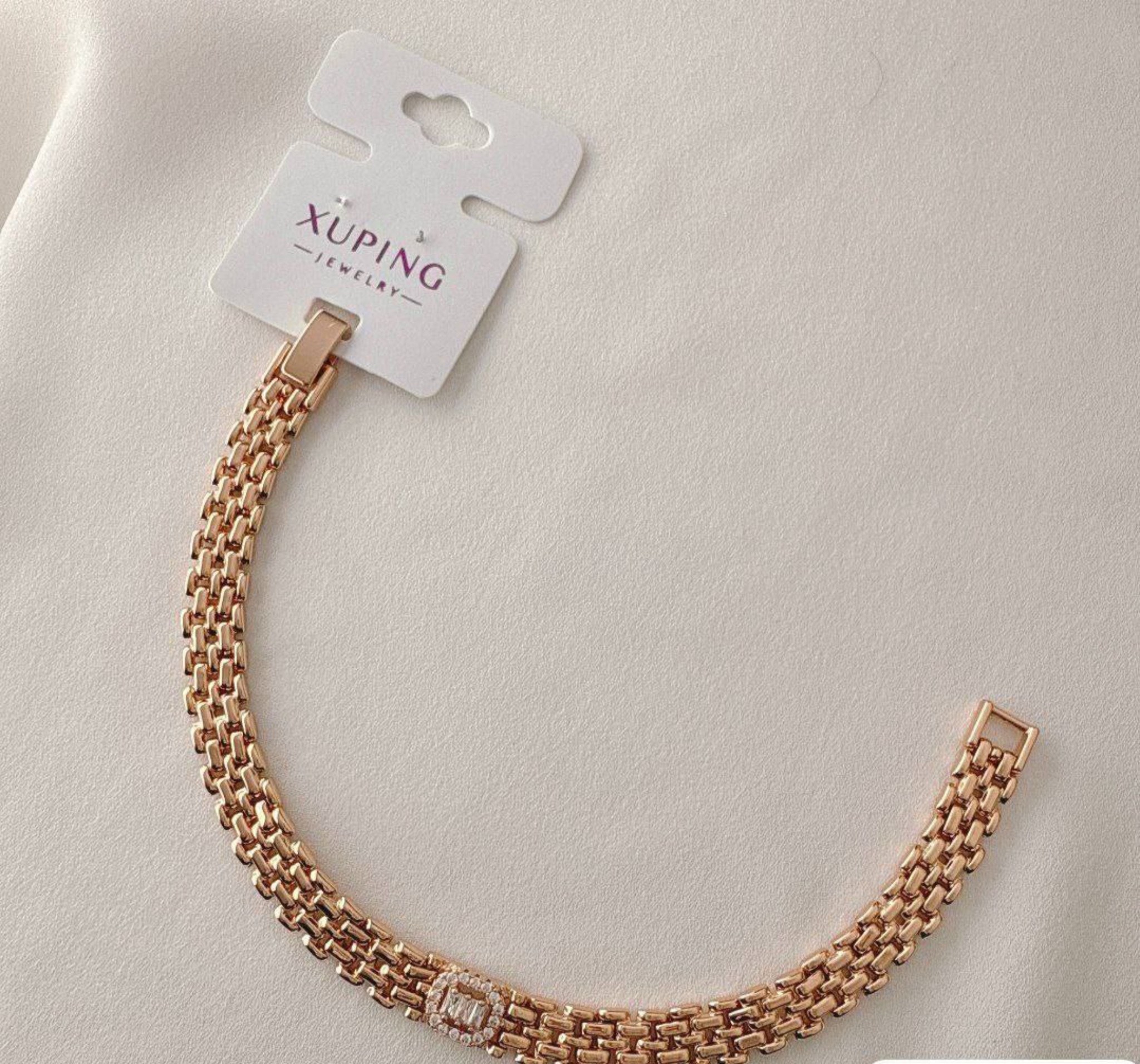 دستبند رزگلد ژوپینگ طرح حصیری با نگین اتمی باگت