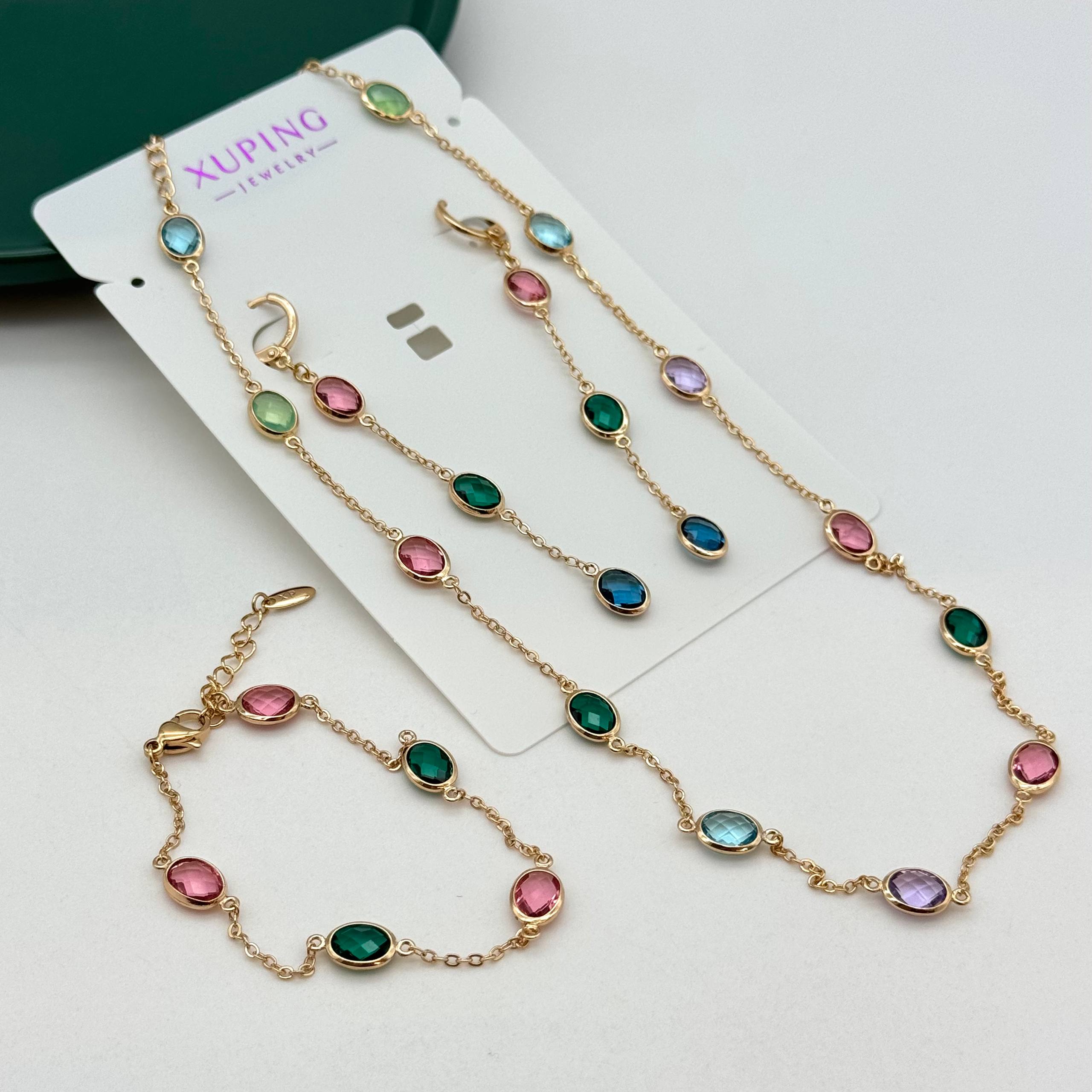 سرویس کامل بدلیجات ژوپینگ طلایی با نگینهای بیضی رنگارنگ شامل گردنبند، دستبند و گوشواره