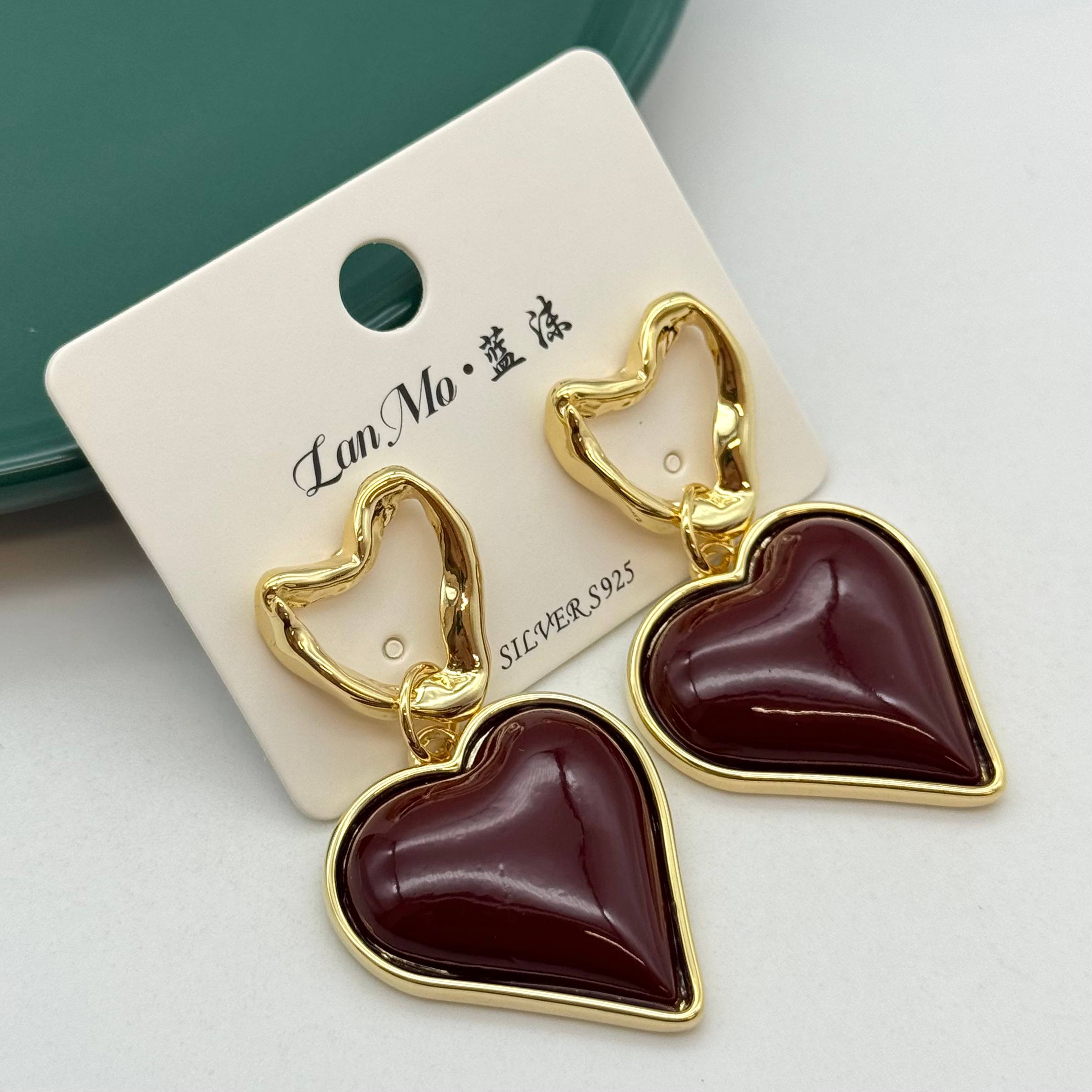 گوشواره آویز قلبی زرشکی و طلایی برند Lan Mo
