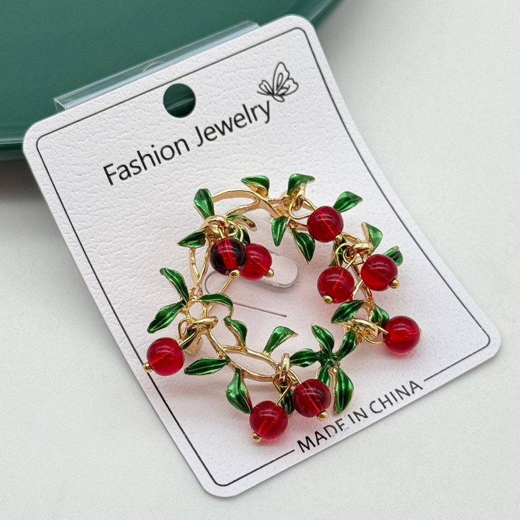 گلسینه فانتزی طرح خوشه گیلاس قرمز با برگهای سبز و فریم طلایی