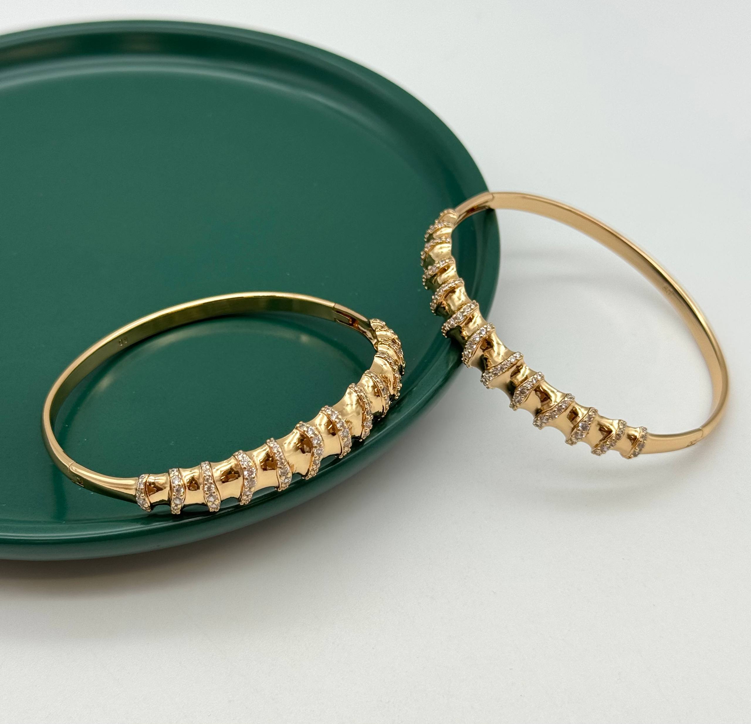 دستبند تکپوش طلایی ژوپینگ با نگینهای اتمی