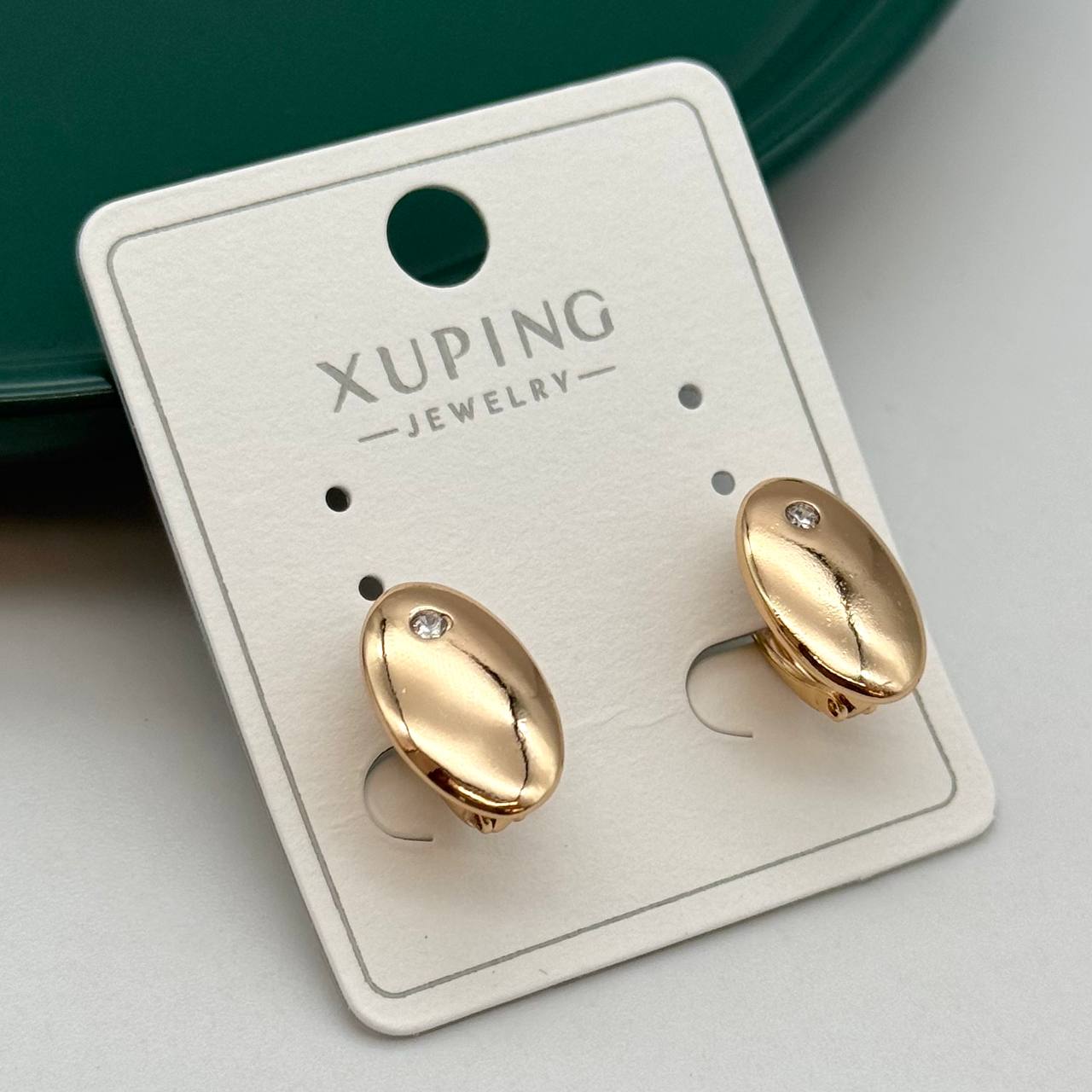 گوشواره طلایی ژوپینگ طرح بیضی براق با نگین کوچک اتمی