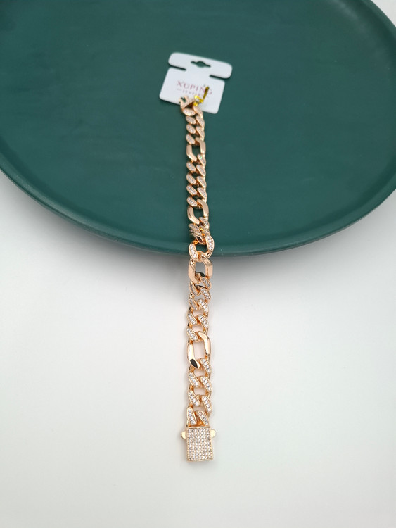 دستبند زنانه ژوپینگ طلایی مدل فیگارو نگینکاری شده