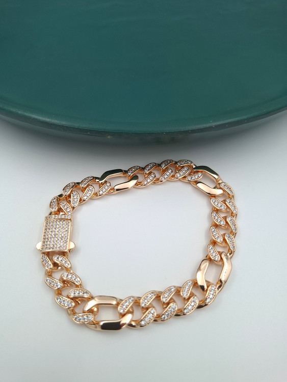 دستبند زنانه ژوپینگ طلایی مدل فیگارو نگینکاری شده