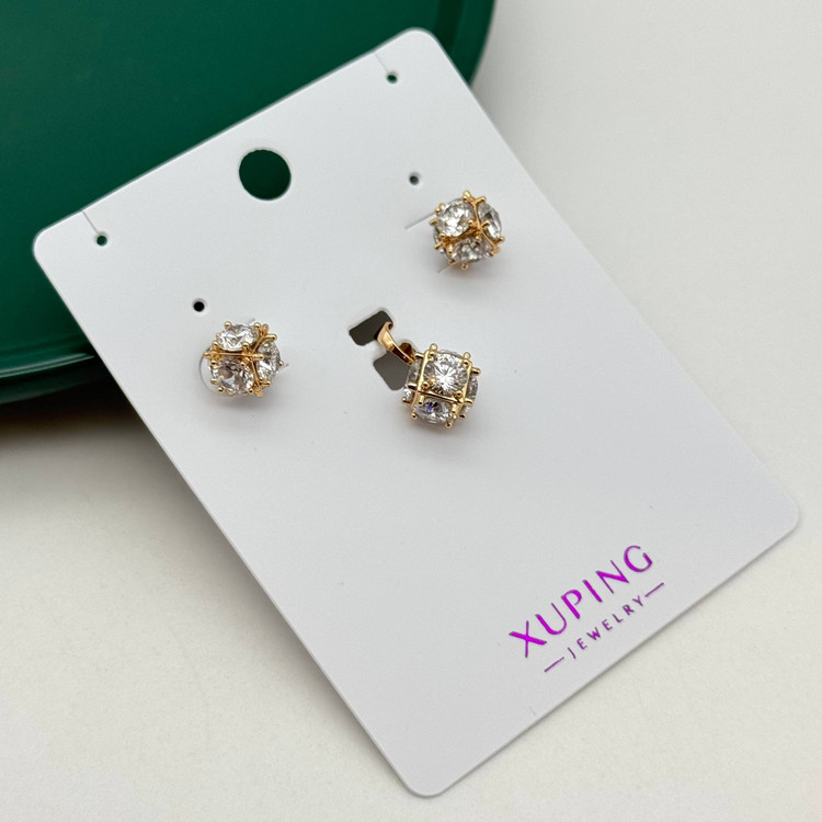 نیم ست بدلیجات ژوپینگ شامل گوشواره میخی و پلاک طرح گوی نگیندار طلایی