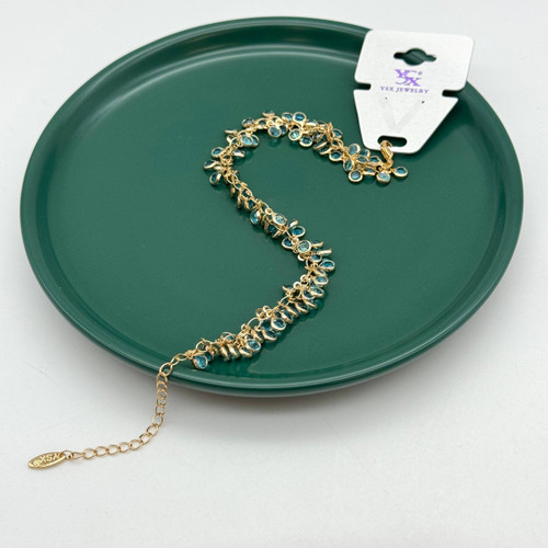 پابند طلایی برند YSX با آویزهای نگیندار آبی