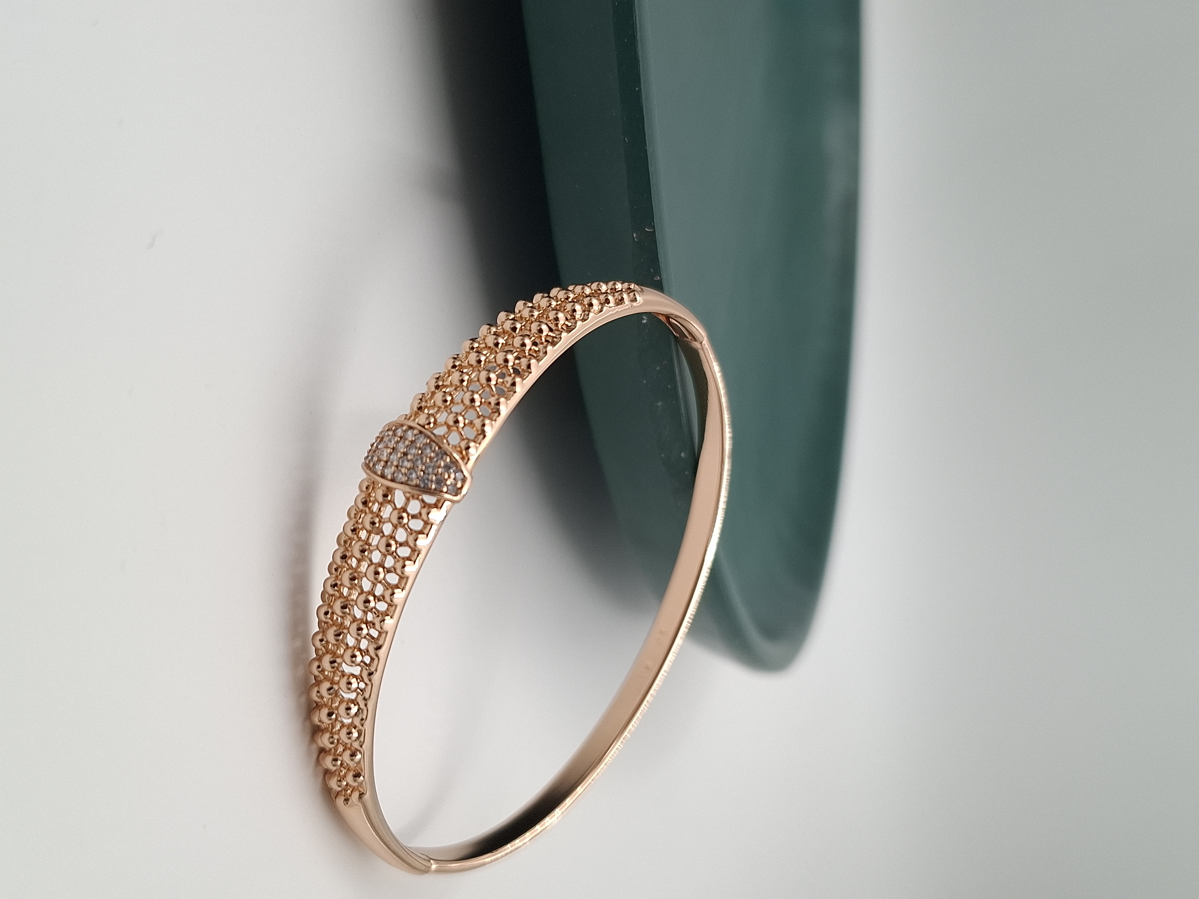 دستبند تکپوش ژوپینگ رزگلد طرح توری و نگیندار