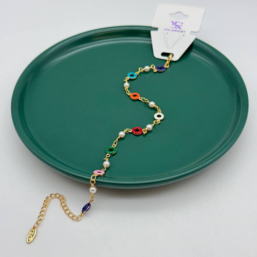 پابند طلایی برند YSX با حلقههای رنگی میناکاری و دانههای مروارید