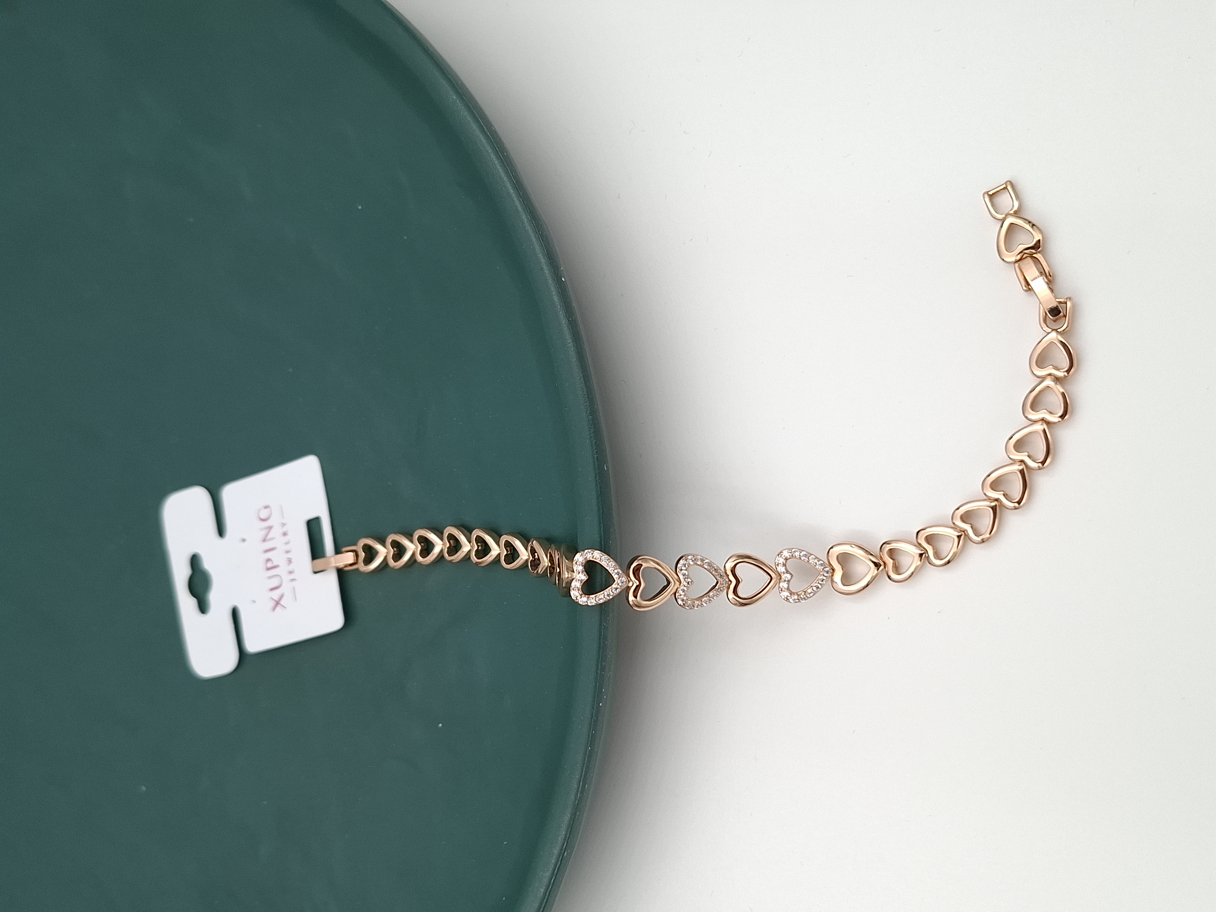 دستبند رزگلد ژوپینگ طرح قلبهای متصل نگیندار