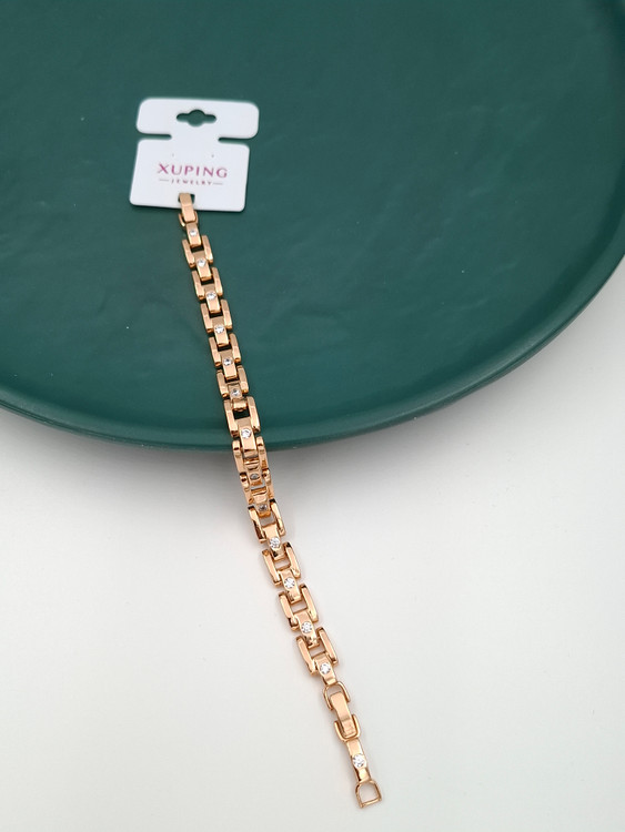 دستبند طلایی ژوپینگ طرح پیوندی با نگینهای سفید