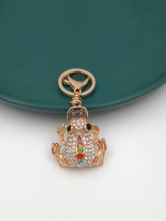 جاکلیدی طلایی طرح قورباغه با نگینهای کریستالی سفید و رنگی