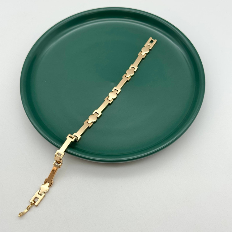 دستبند طلایی ژوپینگ با قطعات هندسی