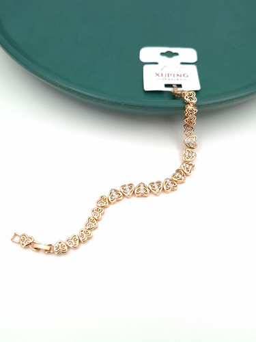 دستبند طلایی ظریف برند ژوپینگ با طرح قلبهای نگیندار توخالی