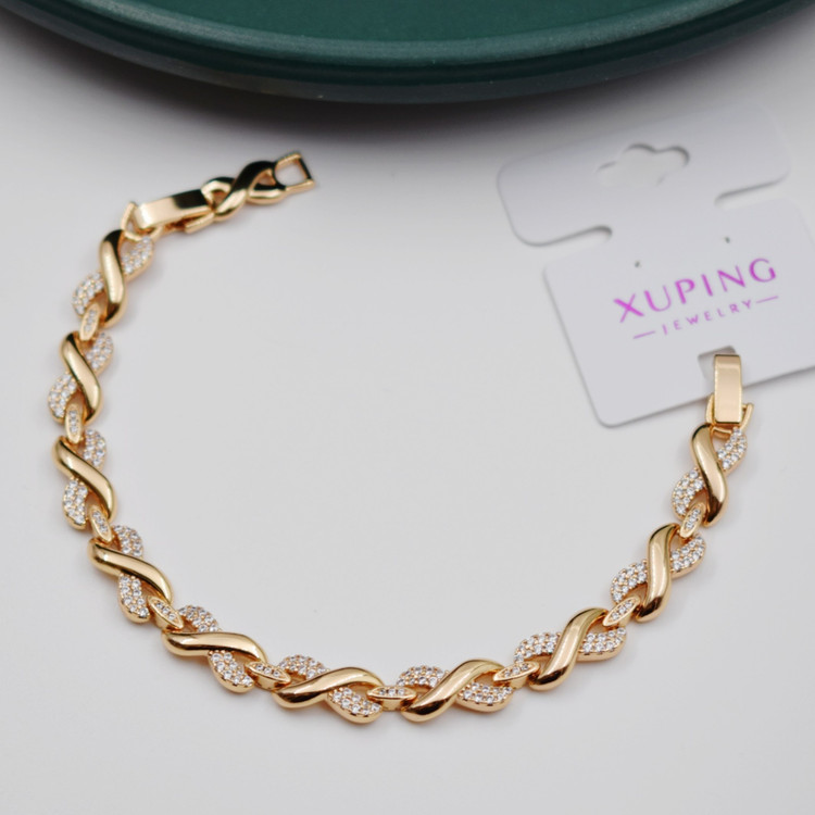 دستبند زنانه ژوپینگ طرح پیچ نگیندار XUPING، طول ۱۹ سانتیمتر و پهنای ۸ میلیمتر، ضد حساسیت
